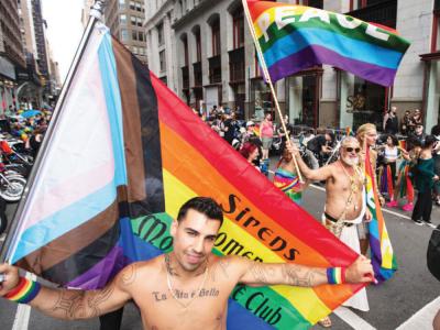 LGBTQ+ Pride revelers flash feathers and flags in the streets from New York to San Francisco
